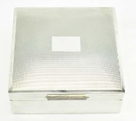 A MID CENTURY 1950S HALLMARKED SILVER CIGARETTE BOX