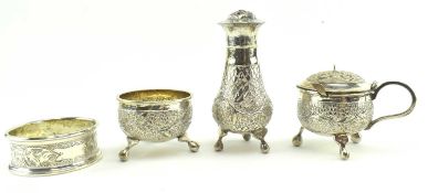COLLECTION OF FOUR INDIAN / ISLAMIC SILVER CONDIMENT SET AND NAPKIN RING