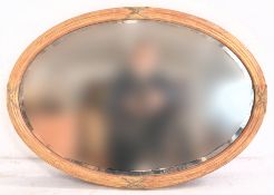 HIGH VICTORIAN GILT PAINTED OVAL MIRROR