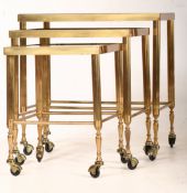 1980S HOLLYWOOD REGENCY BRASS NEST OF TABLES