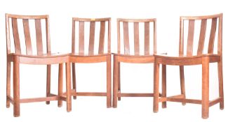 HEAL'S OF LONDON - FOUR EARLY 20TH CENTURY SOLID OAK CHAIRS