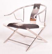 CONTEMPORARY CHINESE MING STYLE COW HIDE CHROME ARMCHAIR