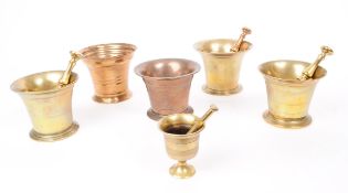 SIX 20TH CENTURY BRASS AND BRONZE PESTLE AND MORTAR PIECES