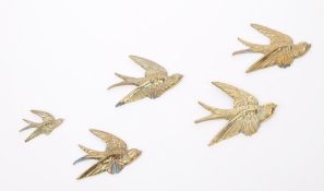 FIVE DECORATIVE BRASS SWALLOW WALL HANGINGS