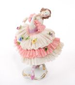 VOLKSTEDT RUDOLSTADT - MID CENTURY GERMAN PORCELAIN LADY FIGURINE