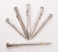 EVERSHARP - COLLECTION OF SIX MID CENTURY SILVER PLATED PROPELLING PENCILS