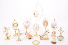 COLLECTION OF LATE 20TH CENTURY DECORATIVE EGG ORNAMENTS AND CHERUB FIGURES