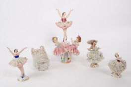 SIX 20TH CENTURY GERMAN PORCELAIN FIGURINES