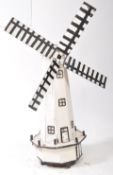 20TH CENTURY WOODEN BLACK AND WHITE WINDMILL SCULPTURE
