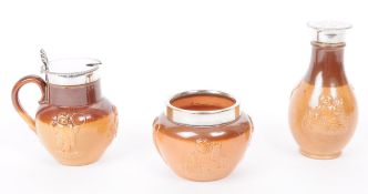 ROYAL DOULTON - EARLY 20TH CENTURY STONEWARE CRUET SET