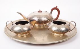EARLY 20TH CENTURY ARTS AND CRAFTS EPNS SILVER PLATED TEA SERVICE