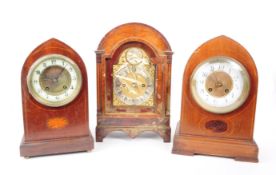 THREE EARLY 20TH CENTURY MAHOGANY CASED MANTEL CLOCKS