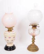 TWO 20TH CENTURY BRASS AND CERAMIC OIL LAMPS
