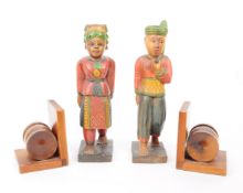 TWO 20TH CENTURY ASIAN FOLK ART CARVED WOODEN FIGURES AND BOOKENDS