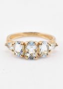 HALLMARKED 9CT GOLD AQUAMARINE FIVE STONE RING