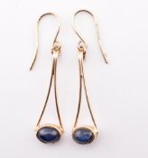 PAIR OF 9CT GOLD & SAPPHIRE CABOCHON PENDANT EARRINGS