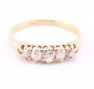 18CT GOLD FIVE STONE DIAMOND RING