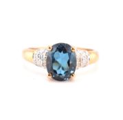 HALLMARKED 9CT GOLD LONDON BLUE TOPAZ & DIAMOND RING