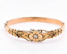 EARLY 20TH CENTURY 9CT GOLD & DIAMOND BANGLE