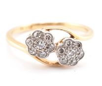 18CT GOLD & DIAMOND CROSSOVER CLUSTER RING