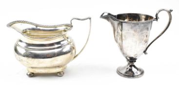 TWO EARLY 20TH CENTURY HALLMARKED SILVER CREAMERS - JUGS