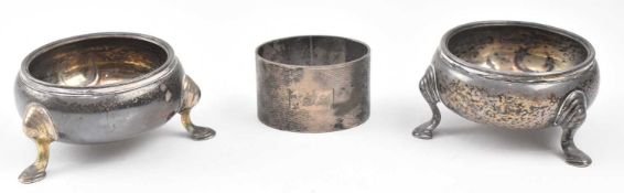 TWO HALLMARKED SILVER SALTS AND A HALLMARKED SILVER NAPKIN RING