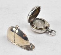AN EDWARD VII HALLMARKED SILVER SOVEREIGN HOLDER & VESTA CASE IN FORM OF JOCKEY CAP