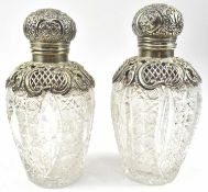 TWO VICTORIAN HALLMARKED SILVER MOUNTED GLASS PERFUME BOTTLES