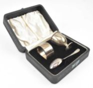 HALLMARKED SILVER CASED THREE PIECE CHRISTENING SET