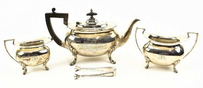 A GEORGE V HALLMARKED SILVER FOUR-PIECE TEA SERVICE