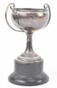 A SMALL GEORGE V HALLMARKED SILVER TROPHY