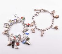 TWO SILVER CHARM BRACELETS
