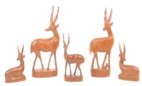 FIVE 1960S / 1970S TEAK CARVED ANTELOPE / DEER SCULPTURES