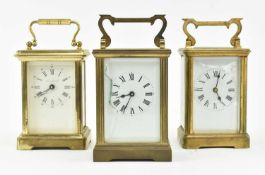 THREE EARLY 20TH CENTURY BRASS CASED & GLAZED CARRIAGE CLOCKS