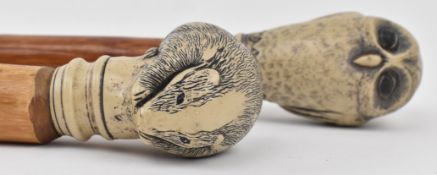 TWO VINTAGE JAPANESE WALKING STICKS WITH RESIN ANIMAL HANDLES