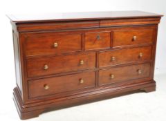 JOHN LEWIS, BRITISH - LATE 20TH CENTURY SIDEBOARD / CHEST OF DRAWERS