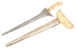 19TH CENTURY KRIS DAGGER WITH FOSSILISED MAMMOTH IVORY HILT