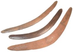 THREE AUSTRALIAN ABORIGINAL STONE CARVED BOOMERANGS