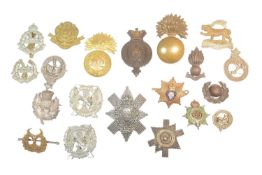 COLLECTION OF ASSORTED MILITARY CAP BADGES