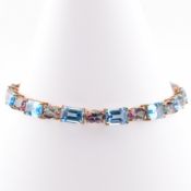 HALLMARKED 9CT GOLD SWISS BLUE & MYSTIC TOPAZ LINE BRACELET