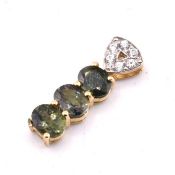 HALLMARKED 9CT GOLD TUNDURU COLOUR CHANGE SAPPHIRE & WHITE ZIRCON PENDANT