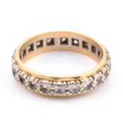 18CT GOLD GEM SET ETERNTY RING