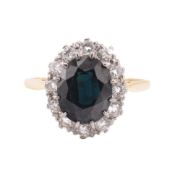 18CT GOLD SAPPHIRE & DIAMOND CLUSTER RING