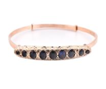 EDWARDIAN 9CT GOLD & GEM SET BANGLE