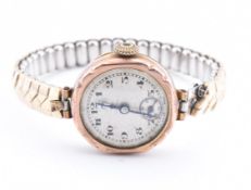 EARLY 20TH CENTURY 9CT GOLD WATCH ON FLEXI STRAP