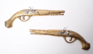 TWO 20TH CENTURY BRONZE WALL HANGING REPLICA FLINTLOCK PISTOL HALVES