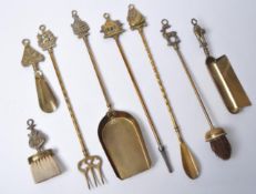 20TH CENTURY BRASS FIRESIDE TOOLS AND IMPLEMENTS