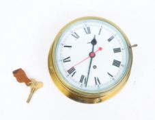 EARLY 20TH CENTURY BRASS SHIPS BULKHEAD CLOCK