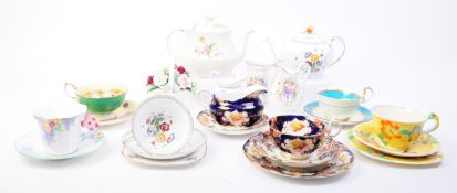 COLLECTION OF 20TH CENTURY BONE CHINA TEA CUPS, TEAPOTS AND MORE