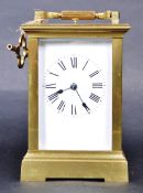 20TH CENTURY BRASS CARRIAGE CLOCK WITH BEVEL GLAZE FRONT